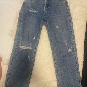 High waist ripped straight leg jeans. Size Large 8/10